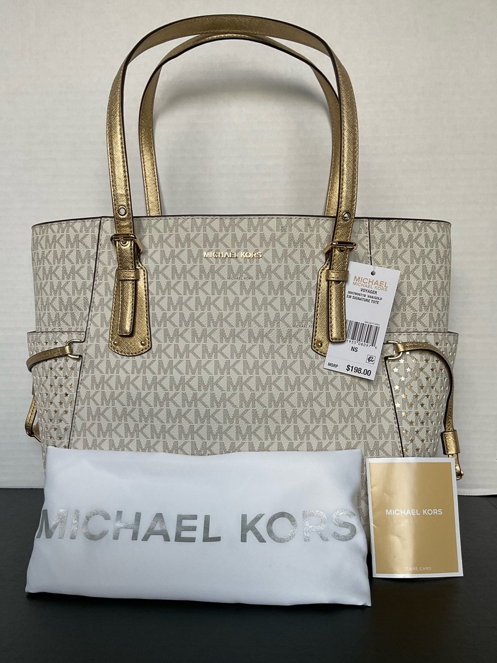 Michael Kors Monogram Voyager Vanilla/Gold  EW Signature Leather Tote NEW
